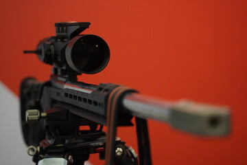 Fototapeta premium Optical sight on a rifle. Weapons for hunting. An exhibition of outdoor activities.