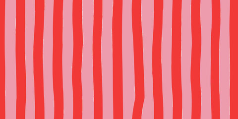 Hand drawn vertical stripes in bright red and soft pink for a playful and cheerful background pattern