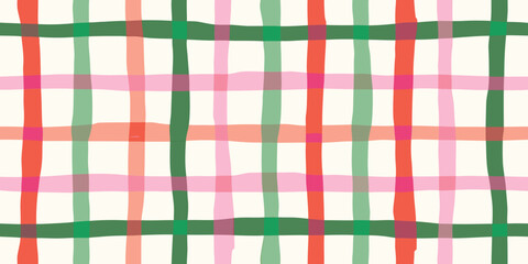 Hand drawn plaid pattern with green pink and orange stripes on cream background