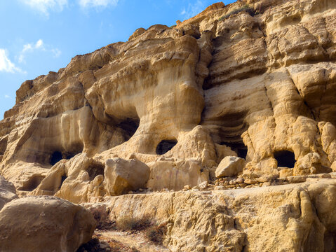 the caves at Matala Beach on the Greek island of Crete
