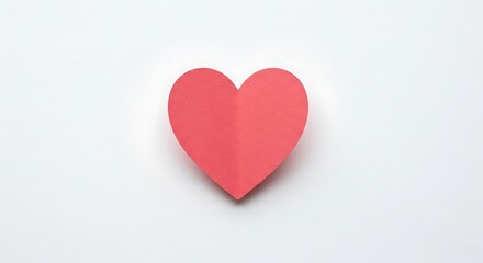 Simple red paper heart shape on a white background, centered and clean