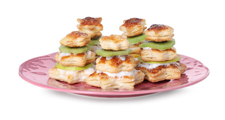 Sweet snacks made of puff pastry and slices of kiwi isolated on white. Christmas food