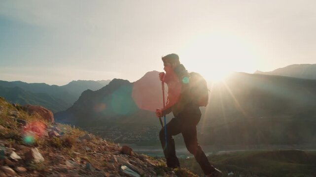 Man climbing mountain path with trekking poles in morning light concept of mindfulness strength adventure self discipline freedom and harmony with nature outdoor spirit motivation