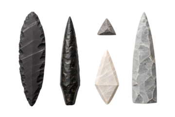 A curated collection of ancient flint and stone artifacts, showcasing primitive tools and prehistoric archaeological discoveries