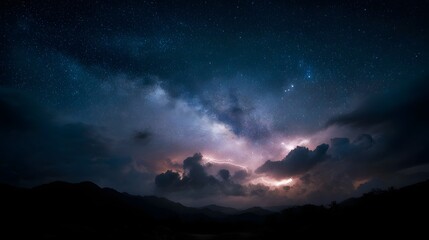 Naklejka premium Dramatic lightning illuminates the Milky Way above a silhouetted mountain range at night
