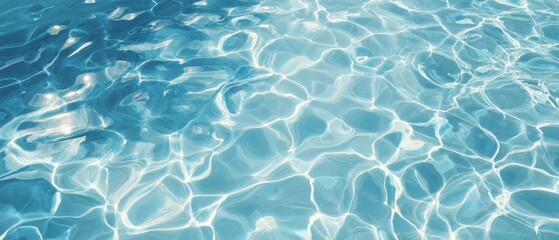 A close-up shot of rippling water with sunlight reflecting on its surface