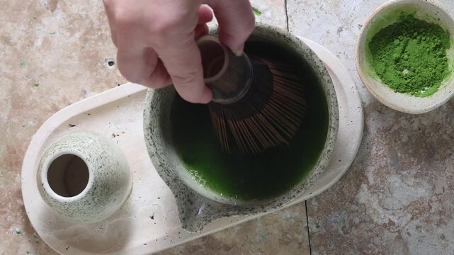 Matcha Tea Ceremony. Matcha Still Life. A refreshing matcha served with ceramic dishware