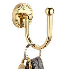 A golden hook with keys and a bag hanging on it against a black background in a studio shot