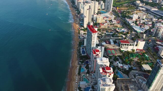 Cinematic aerial view of Acapulco Bay and its surrounding Pacific waters