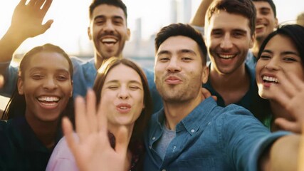 Diverse young adults cheerfully film a handheld selfie on a sun-kissed urban rooftop at golden hour, city skyline bokeh. Vibrant urban social gathering