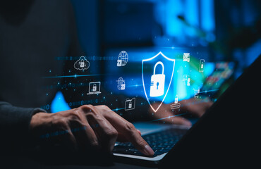 Cybersecurity and data protection concept. Person using laptop with padlock icon, representing secure online network, internet privacy, safe online transactions for businesses and personal information