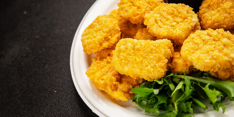 Chicken nuggets fast food natural tasty appetizer fresh delicious gourmet food background on the table rustic top view copy space