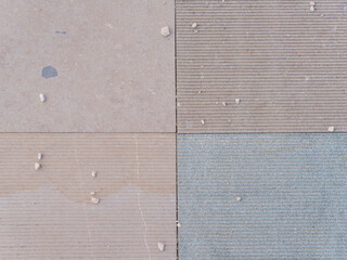 Grid Layout of Outdoor Flooring Materials in Neutral Tones