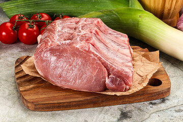 Raw pork loin cut with bone
