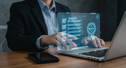 Businessman interacting with holographic quality assurance checklist and certification badge on laptop screen, symbolizing standards, compliance, and excellent service management