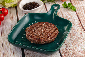 Grilled juicy beef cutlet for burger
