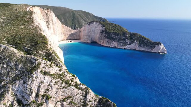 Aerial drone cinematic video of one of the most photographed beaches in the world called navagio or shipwreck a ship rest to rust ashore vanishing through the years, Zakinthos island, Ionian, Greece