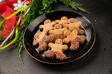 Gingerbread man cookies Christmas sweet dessert new year Christmas background tasty snack fresh delicious gourmet food background on the table rustic top view copy space