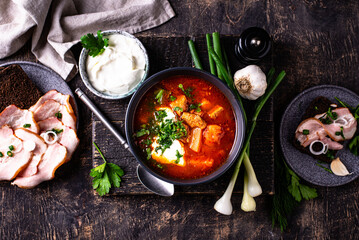 Traditional Ukrainian borsch with sour cream
