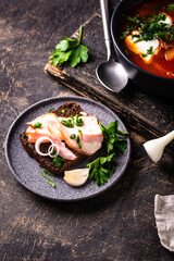 Traditional Ukrainian borsch with sour cream