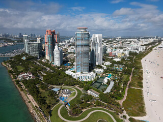 Naklejka premium Miami Beach skyline aerial view. Miami city from drone. Tropical Miami scene. Miami district sky view. Famous oceanfront. Panoramic coastline. South beach panorama view. Summer travel in Florida.