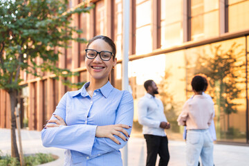 Confident business team outdoors in the city