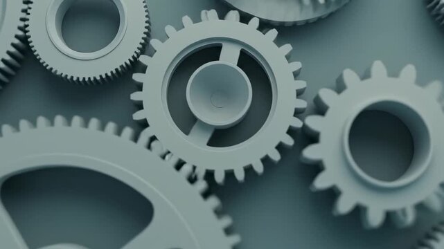 Close up of interlocking gears in a mechanical system.