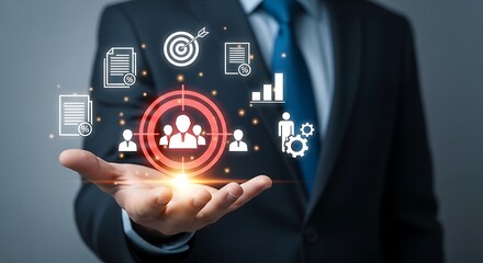Businessman displays digital interface with icons representing business strategy and human resources