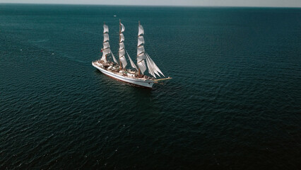 aerial view - tall ship at sea in full sail