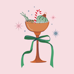 Chic Christmas cocktail with festive bauble, candy cane and coquette bow. New Year Eve champagne or martini glass. Happy Holidays greeting card. Hand drawn vector illustration.