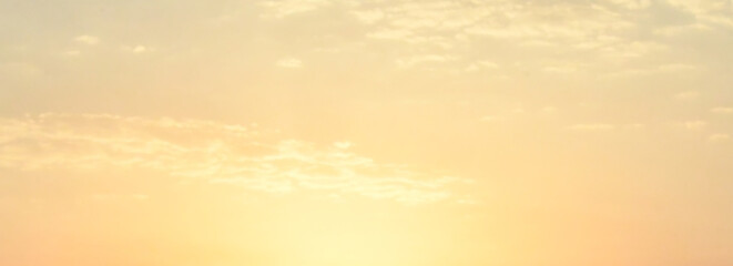 Yellow golden sky pastel with fluffy cloud. Summer sunset nature landscape. Beautiful sunrise background. Cloudscape gradient abstract.