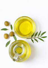 olive oil in a bottle on a white background top view.. Vertical photo format