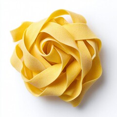 Uncooked tagliatelle pasta nest featuring italian food