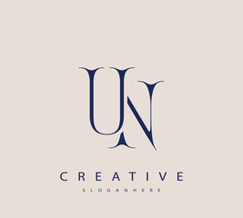 Sophisticated and stylish letter logo design featuring the combination of the letters U and N in dark blue color scheme perfect for branding stationery website headers or social media graphics