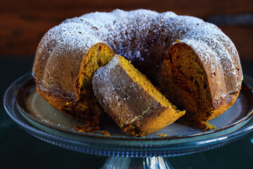 Sliced Pumpkin Spice Bundt Cake with Sprinkled Powdered Sugar