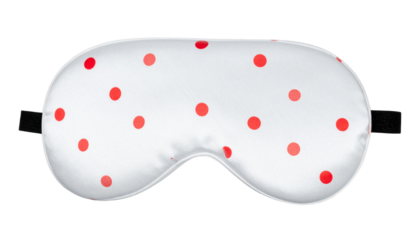White eye sleeping mask with playful red dots, soft and cozy for restful sleep. Ideal for wellness, relaxation, travel, self-care, and lifestyle design projects.