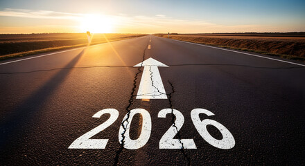 Driving to upcoming 2026 on open road at sunrise. 
