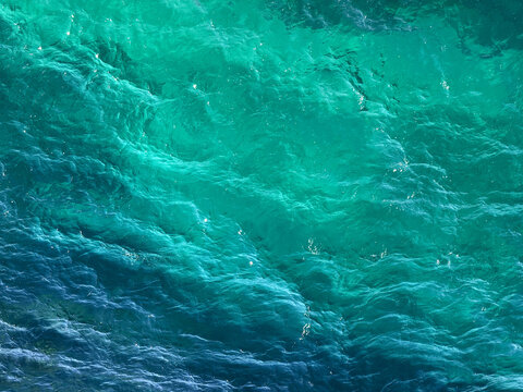 Blue navy sea clear water surface.