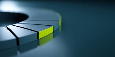 Close-up of a segmented circular chart with one highlighted yellow segment on a reflective surface in a dark environment
