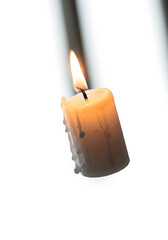 christmas candle with warm flame, christmas festive wax light decor, holiday candle for cozy ambiance
