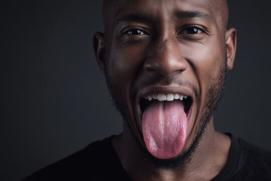 African American man showing his tongue 