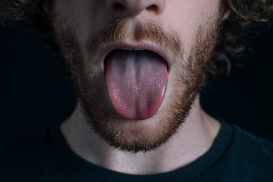 A person showing his tongue 