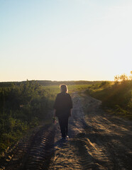 woman walking on the road