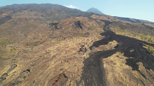 CAPE VERDE - 9.4.2025 - Wonderful aerial footage panning the lava fields and volcanic soil of Cape Verde's Pico do Fogo island.