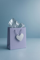 Minimal purple gift bag with silver heart-shaped tag