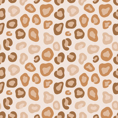 Seamless leopard print pattern with warm neutral tones and organic shapes