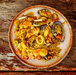 Traditional and Delicious Seafood Paella with Mussels, Shrimp, and Calamari	