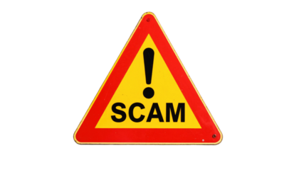 Triangular sign with black "SCAM" text and yellow exclamation point on a black background