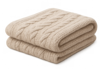 Beige folded cable knit blanket for warmth and comfort, soft wool textile creating a cozy winter feeling on transparent background