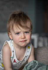 Portrait of a Infant girl posing on bed in bedroom
